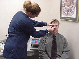 Man being tested for Glaucoma