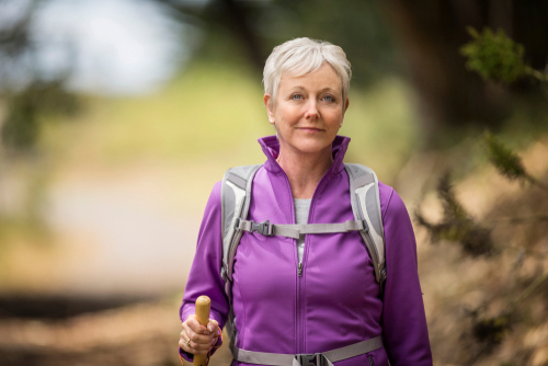 Older woman hiking after Cataract Surgery