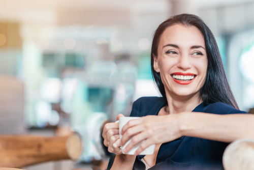 Woman smiling after Presbyopia treatment