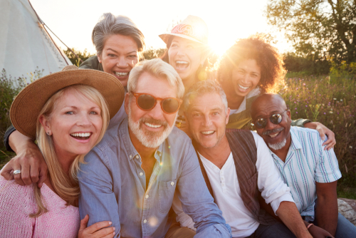 Group of older people smiling with cataracts