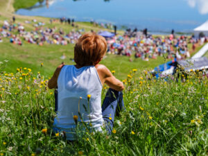 Boy sitting on a hill