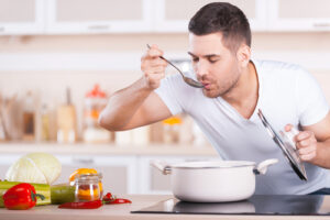 Man tasting food