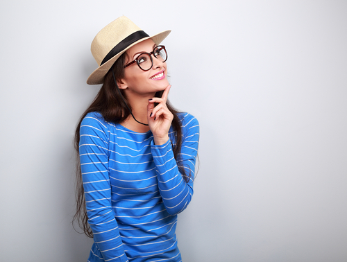 Woman in hat and glasses