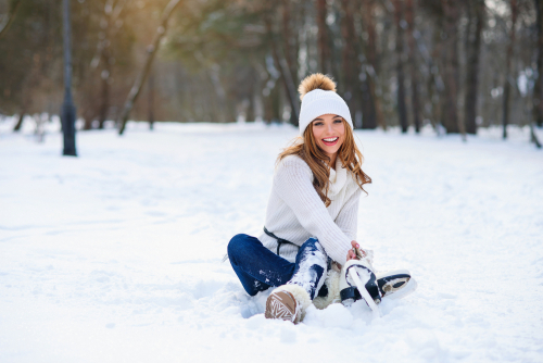 Woman Sitting in Snow